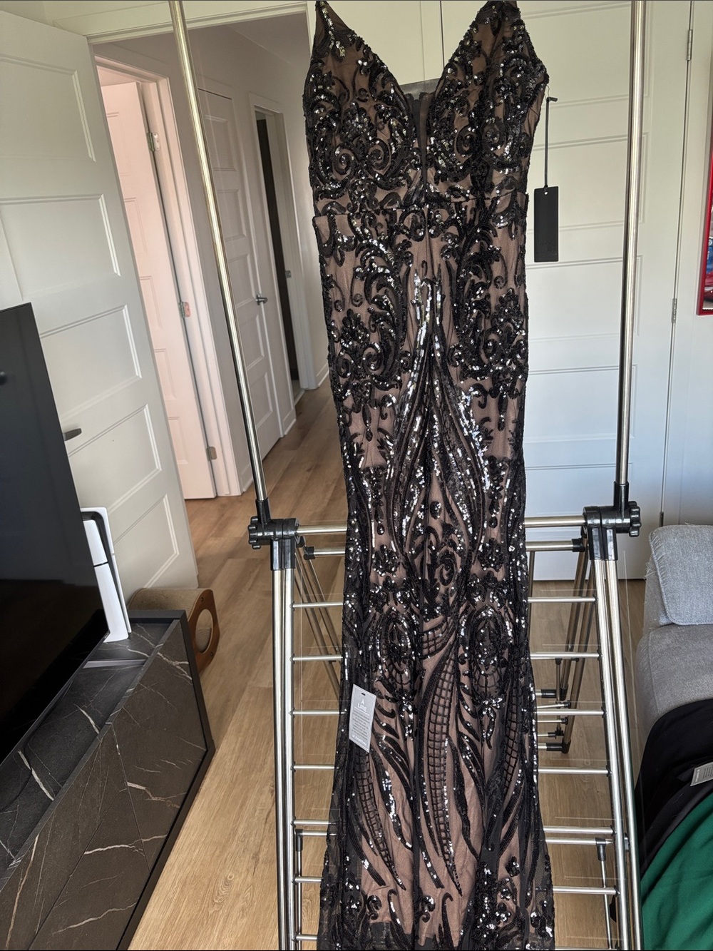 le chateau Black Sequined Nude Illusion Evening Gown